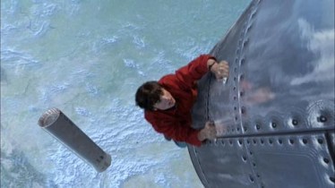 Clark alcança um míssil para detê-lo: escalada de heroísmo.