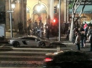 Rises LA bruce wayne with cane