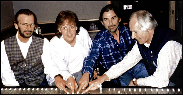 Com os remanescentes dos Beatles em 1994 para o projeto Anthology. 