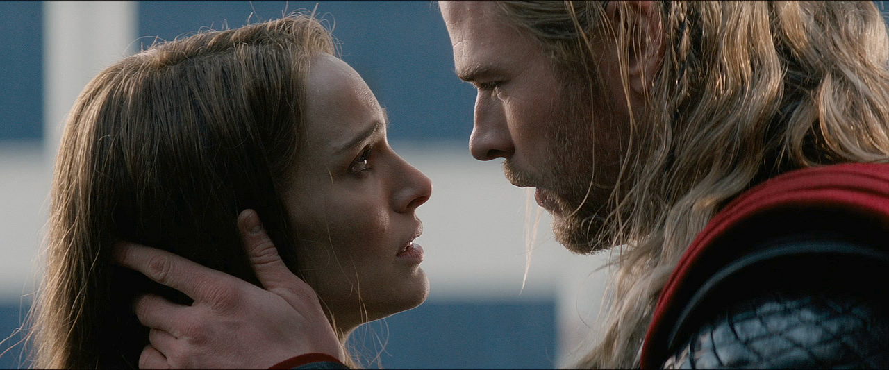 thor 2 jane and thor almost kissing